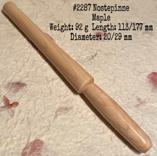 Wooden tool with specifications on a textured beige background