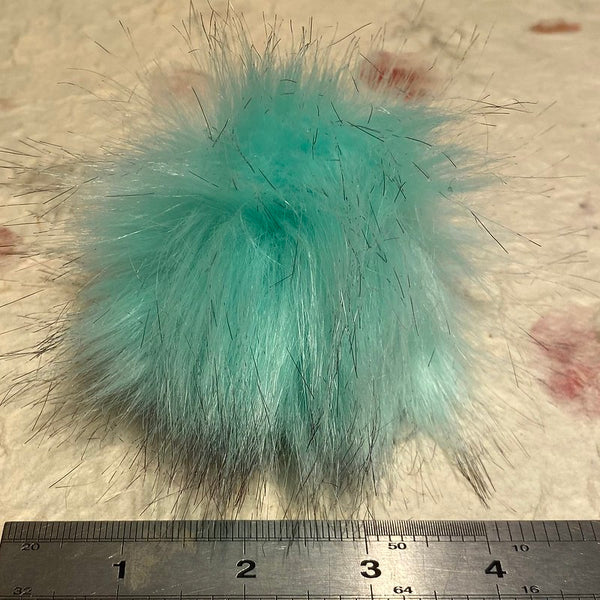 IxCHeL Fibre And Yarns Bunny Butt Pom Poms colourway Mint with measuring ruler