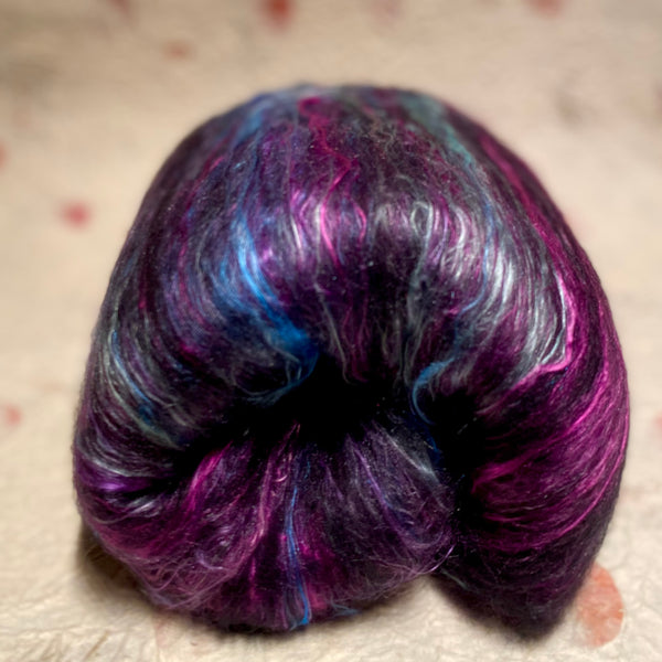IxCHeL Fibre And Yarns Gothic Bunny Batt Aurora with blues and purples and a dash of mint green with black merino and angora bunny