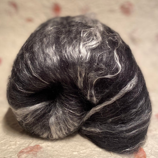 IxCHeL Fibre And Yarns Gothic Bunny Batt Ghost colour way with white mulberry silk and black merino and angora bunny