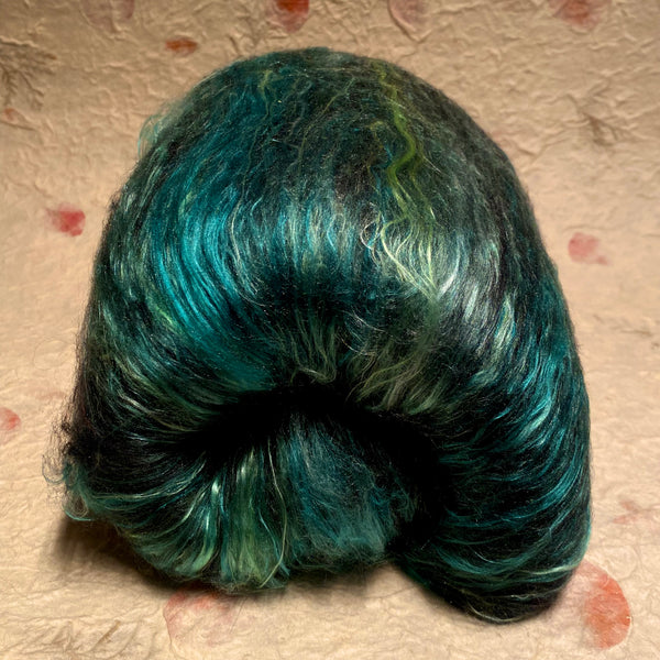 IxCHeL Fibre And Yarns Gothic Bunny Batt Monsters colour way with teal, green coloured mulberry silk and black merino and angora bunny