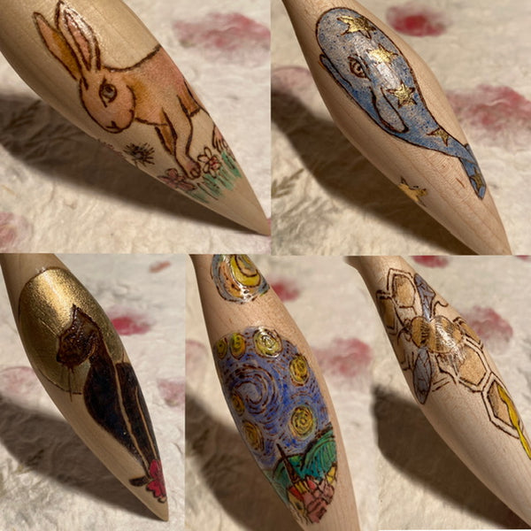 IxCHeL Fibre And Yarns LotBD Lotus Phang Support Spindles a collection of Spindles showing Pyro and Painted items