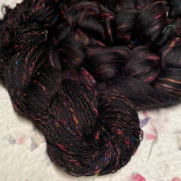 IxCHeL Fibre & Yarns Galaxy Bunny Tops colourway Rainbow sample photo of a yarn and top together