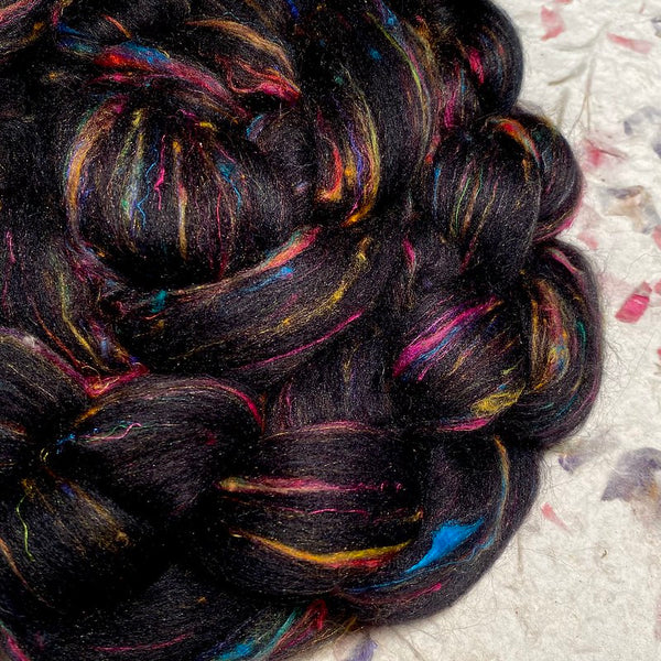 IxCHeL Fibre & Yarns Galaxy Bunny Tops colourway Rainbow is Black with flecks of colour popping through it