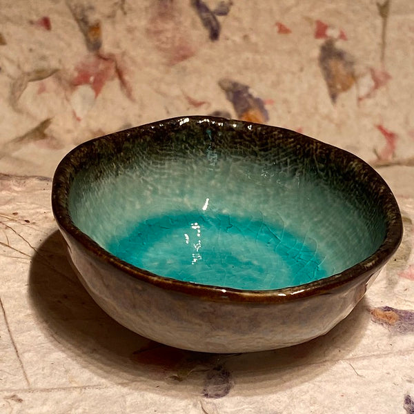 IxCHeL Fibre & Yarns Ceramic Spindle Bowl  showing the beautiful Turquoise coloured glaze of the inside.